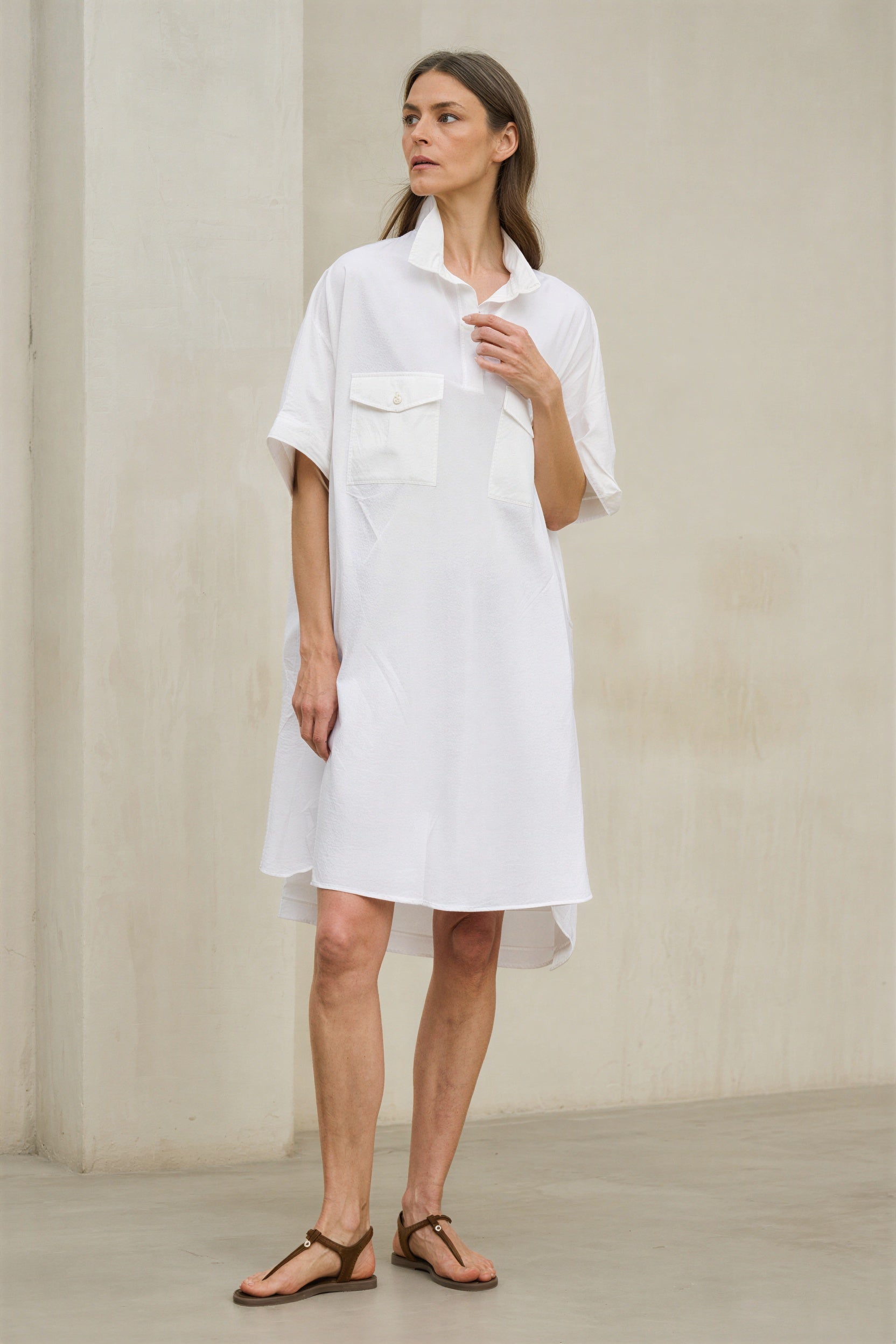 Orlena white flowy shirt dress for a daytime guest. Made in Spain Orlena white flowy shirt dress for a daytime guest. Made in Spain